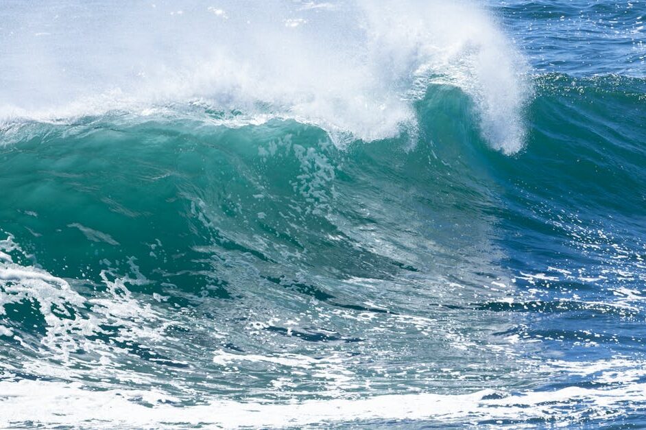 Captivating ocean wave crashing at Culburra Beach, New South Wales, Australia.